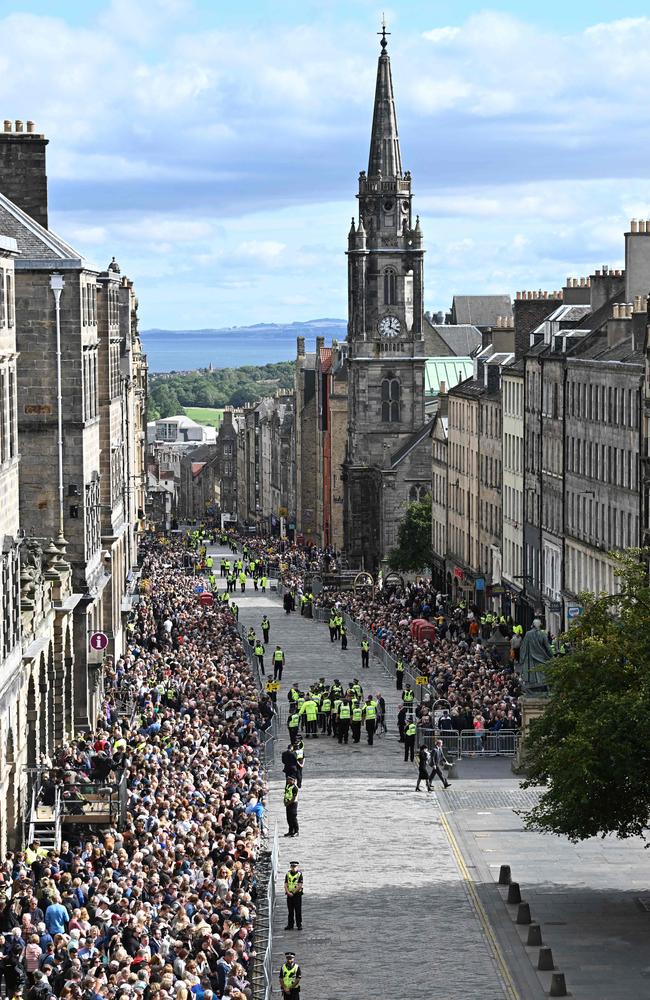 Crowds build on The Royal Mile in Edinburgh, ahead of the arrival of the coffin of the late Queen Elizabeth II. Picture: AFP