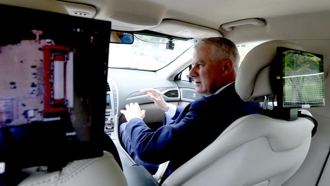 Deputy Prime Minister Michael McCormack takes a ride in a driverless car at the Torrens Parade Grounds in Adelaide in 2018. Picture: AAP