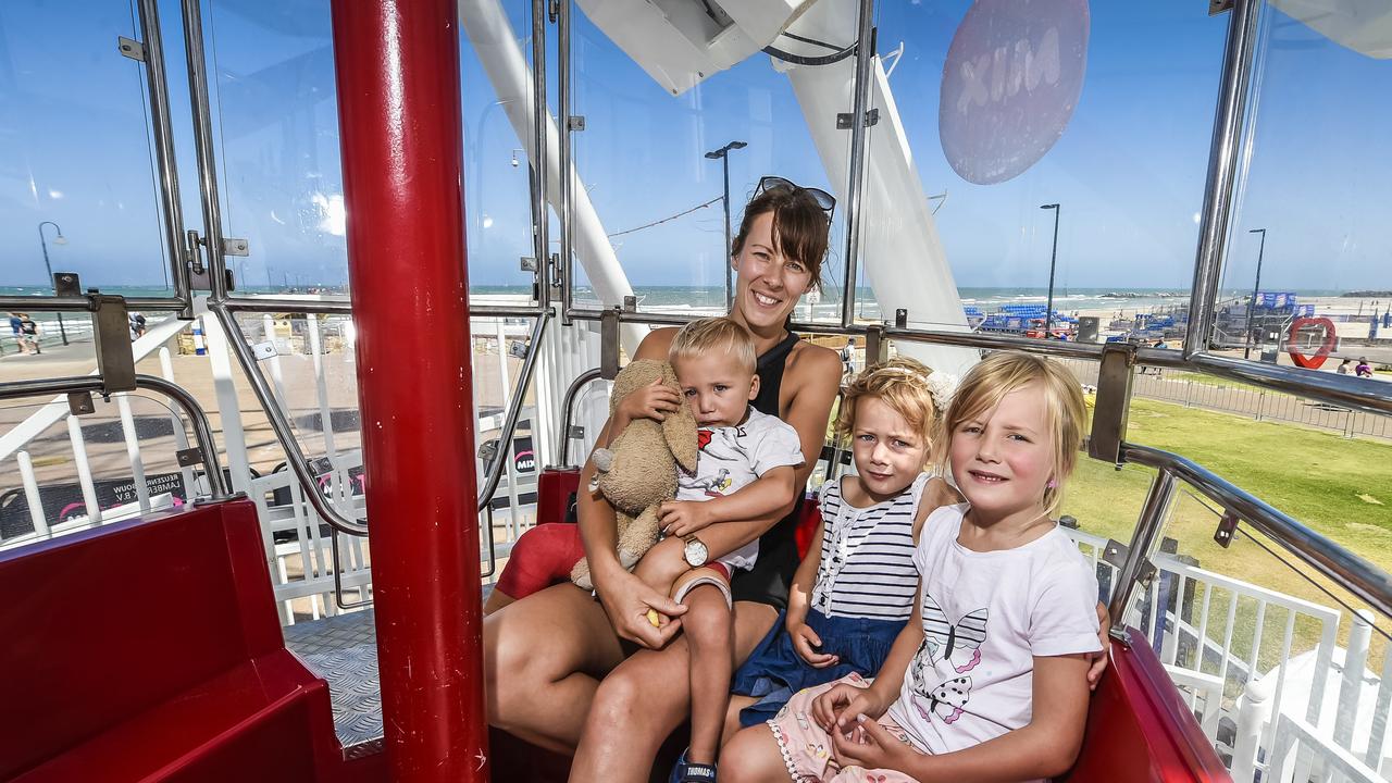 A similar temporary ferris wheel was set up at Glenelg and has now become a key attraction for the area. Pic. AAP/ROY VANDERVEGT