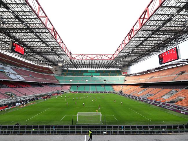 The empty stadium for the Serie A match between AC Milan and Genoa CFC at San Siro stadium in Milan, Italy. Picture: Marco Luzzani/Getty