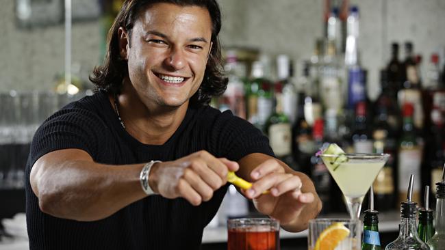 Bartender Filippo Patrizi whips up a negroni. Picture: Adam Yip