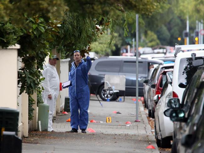 Police have begun the ugly task of removing the bodies from the mosque. Picture Gary Ramage