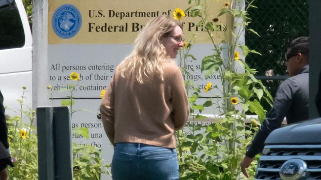 Theranos' founder Elizabeth Holmes arrives at the Federal Prison Camp in Bryan, Texas. (Photo by Mark Felix / AFP)