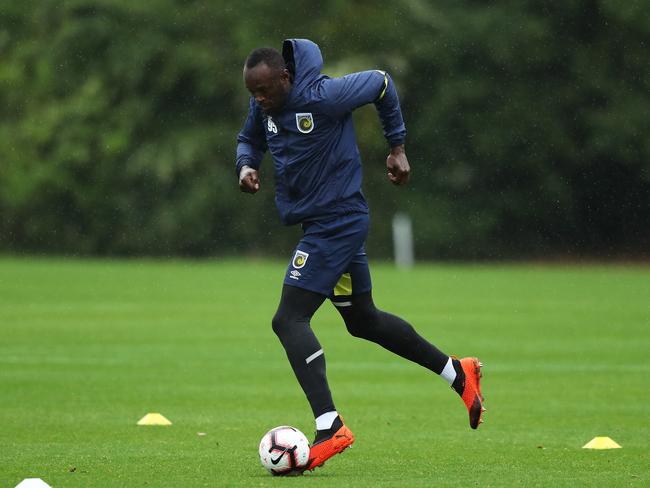 Usain Bolt trains with the Central Coast Mariners at Pluim Park, Tuggerah ahead of making his starting debut on Friday. Picture: Brett Costello