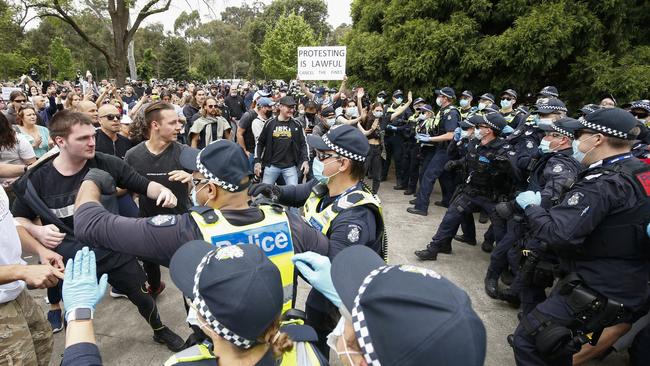 Violence quickly erupted between police and protesters. Picture: Daniel Pockett