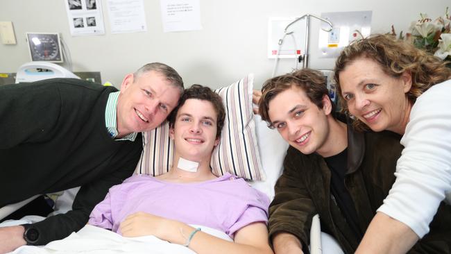 Conor with his family — dad Sean, brother Seamus and mum Beck. Picture: Annette Dew