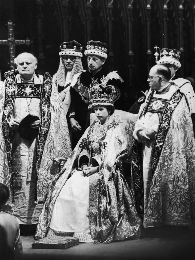 Queen Elizabeth II, Archbishop of Canterbury Geoffrey Fisher and dignitaries at her coronation.