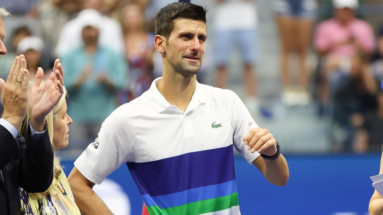 Novak Djokovic was overcome. Photo: Matthew Stockman/Getty Images/AFP.