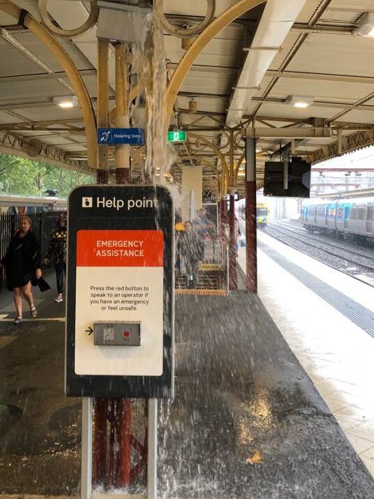 Rain leaks through the roof at Flinders Street Station.