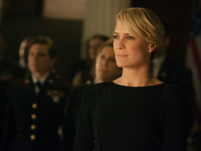 Busy...Wright shines as steely ambitious Claire Underwood on<i> House of Cards.</i>