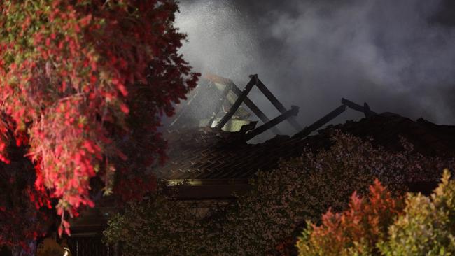 Firefighters discovered a hydroponics drug setup within the false walls of a house in Toongabbie. Picture Dean Asher