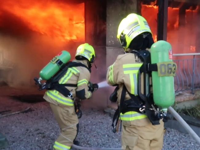 Firefighters battle a blaze in Doonside, in Sydney's west. Photo: FRNSW