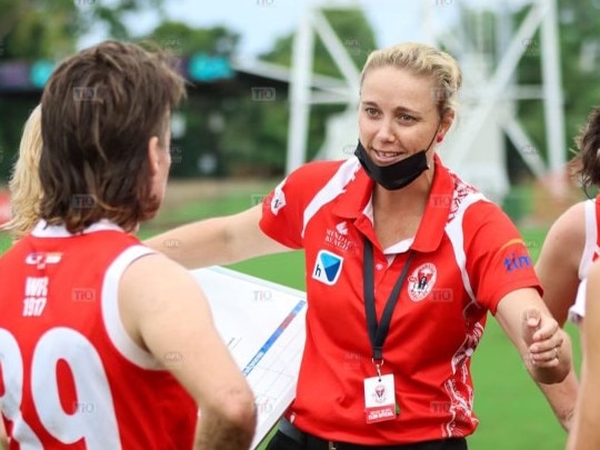 AFL NT premier women's Waratah coach Heidi Thompson instructing the girls on play. Picture: supplied.