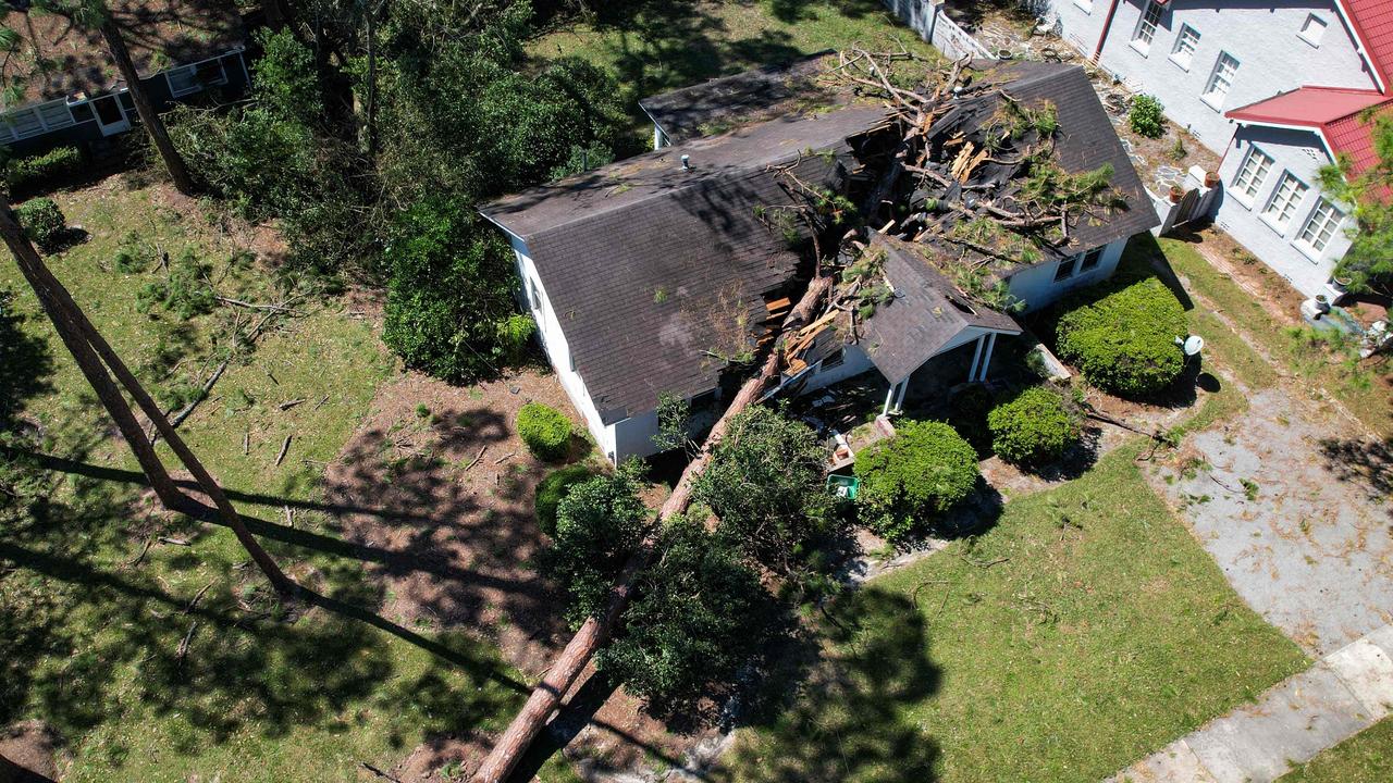 An aerial photo of a house hit by a fallen tree in Valdosta, Georgia. Picture: John Falchetto / AFP