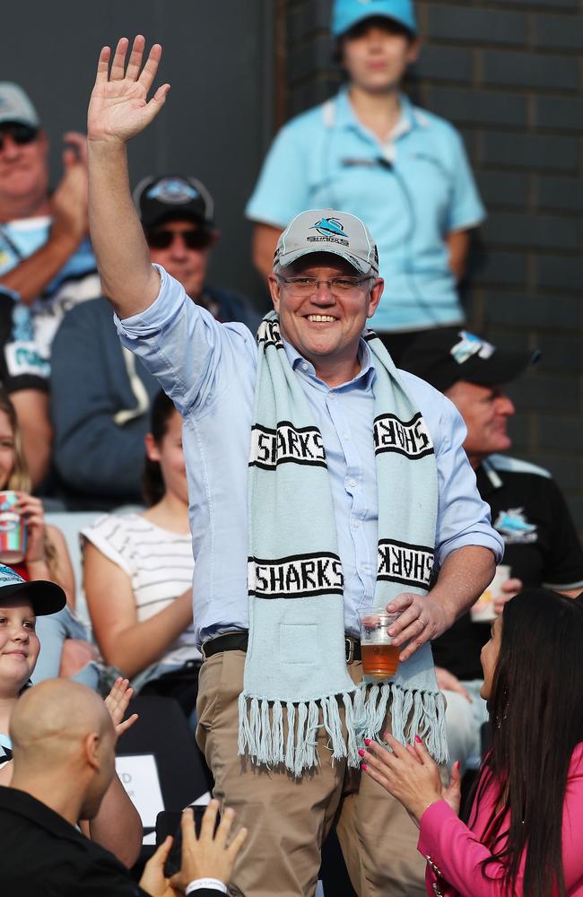 Prime Minister Scott Morrison waves to the crowd during the match between the Cronulla Sharks and the Manly Sea Eagles in Sydney on Sunday. Picture: Matt King/Getty