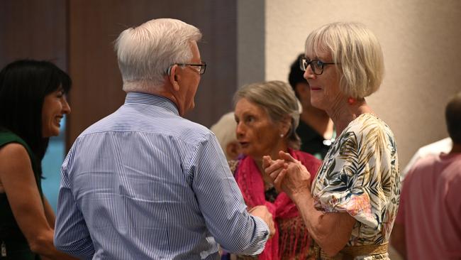 Deputy mayor Terry James speaks with petition organiser Frankie Hogan after the council vote. Picture: Isaac McCarthy