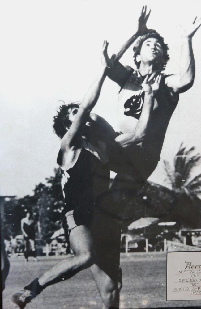 Trevor Sutton flies over Buffalo Kimberley Hunter in a 1981 match at Nightcliff Oval.