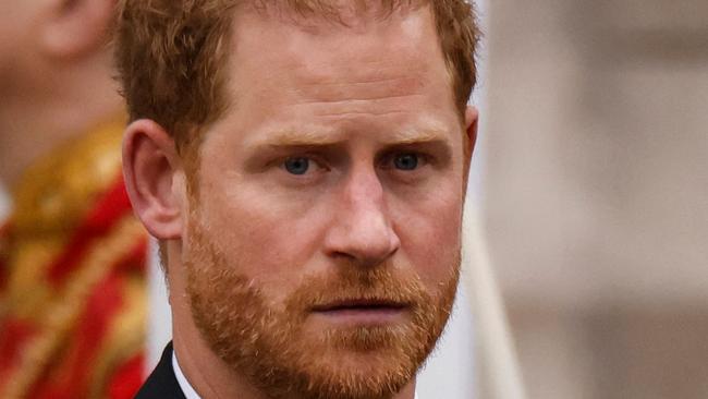 Britain's Prince Harry, Duke of Sussex leaves Westminster Abbey after the Coronation Ceremonies of Britain's King Charles III and Britain's Queen Camilla in central London on May 6, 2023. - The set-piece coronation is the first in Britain in 70 years, and only the second in history to be televised. Charles will be the 40th reigning monarch to be crowned at the central London church since King William I in 1066. Outside the UK, he is also king of 14 other Commonwealth countries, including Australia, Canada and New Zealand. (Photo by Odd ANDERSEN / AFP)