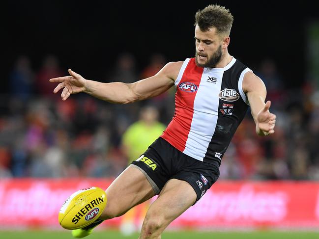 Mav Weller gets a kick away for St Kilda. Picture: Dave Hunt/AAP