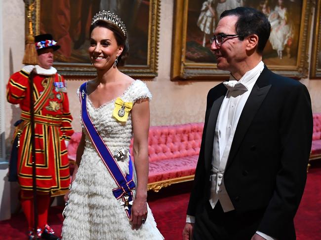 Catherine dazzled in white Alexander McQueen at the state banquet for US President Donald Trump. Picture: Getty