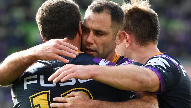 Kenny Bromwich celebrates a try with Cameron Smith. Picture: AAP