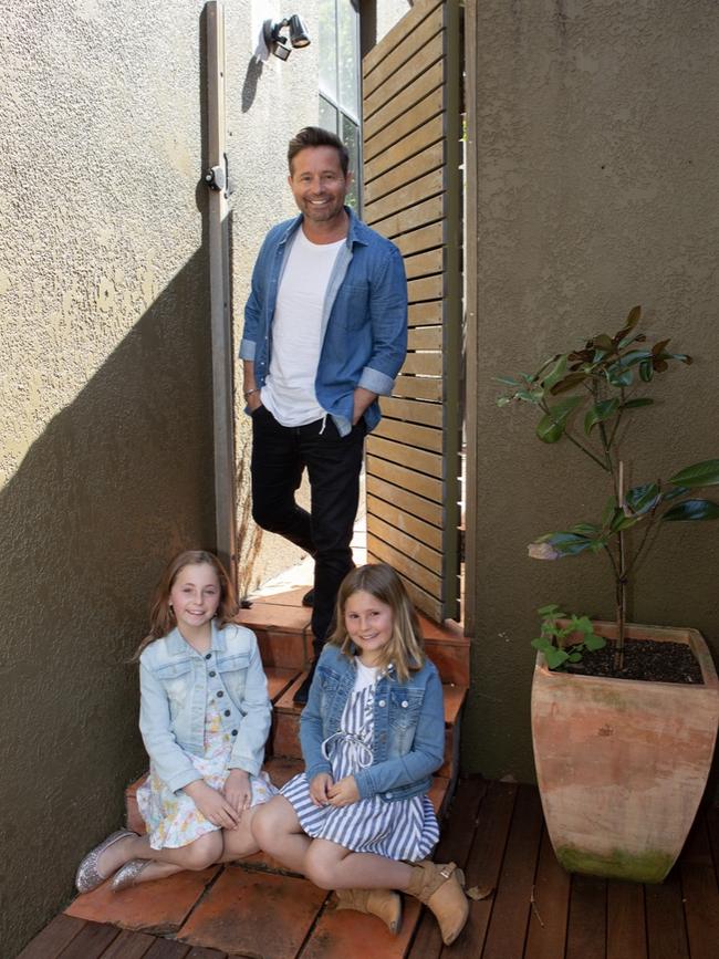 TV personality Stevie Jacobs with his two girls during lockdown.