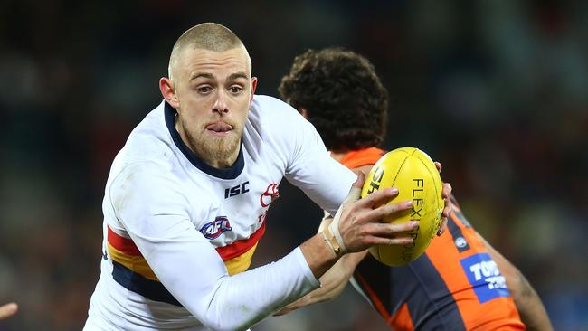 Hugh Greenwood evades the Giants on Saturday. Picture: Mark Nolan/Getty Images