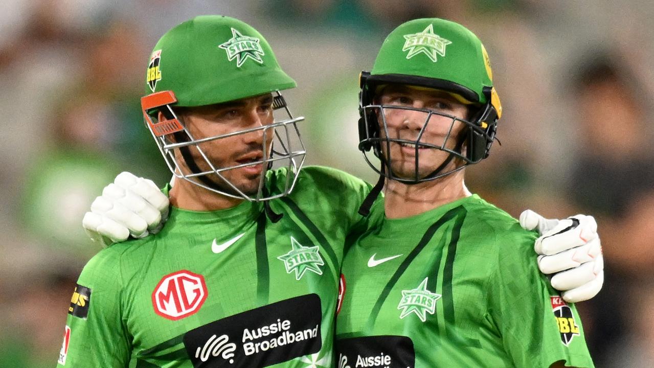 Marcus Stoinis and Hilton Cartwright celebrate the Stars win on Sunday (Photo by Morgan Hancock/Getty Images)