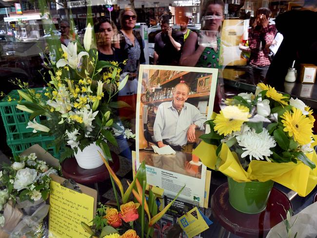 People pay their respects for Sisto Malaspina who was killed in the attack. Picture: AFP