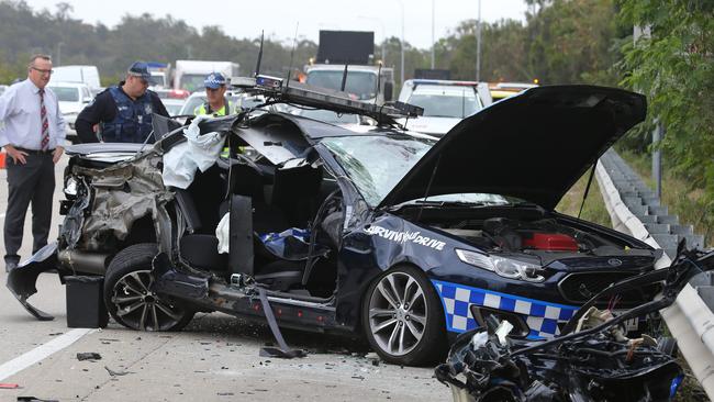 Emergency Services at an accident involving a police car and a truck just past Helensvale in the Southbound lanes on the M1. Picture Glenn Hampson.