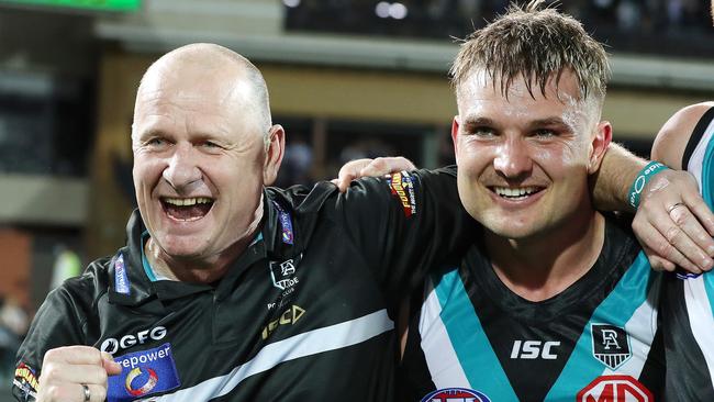 Ken Hinkley and Ollie Wines celebrate Port Adelaide’s qualifying final win. Picture: Sarah Reed