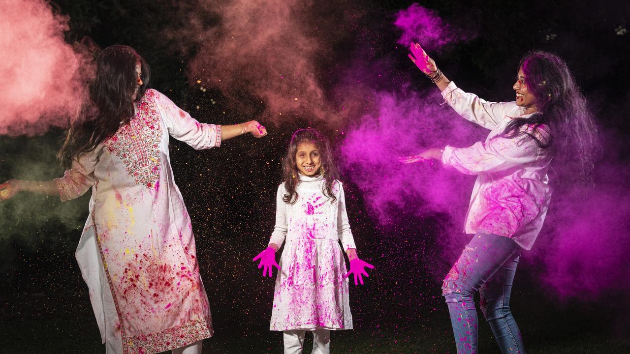 Having fun with Holi powder are (from left) Kritika Ghimire, Aarohi Mahida and Sanya George as the Toowoomba Indian and Nepalese communities combine to celebrate Holi, the festival of colours, Tuesday, March 19, 2024. Picture: Kevin Farmer