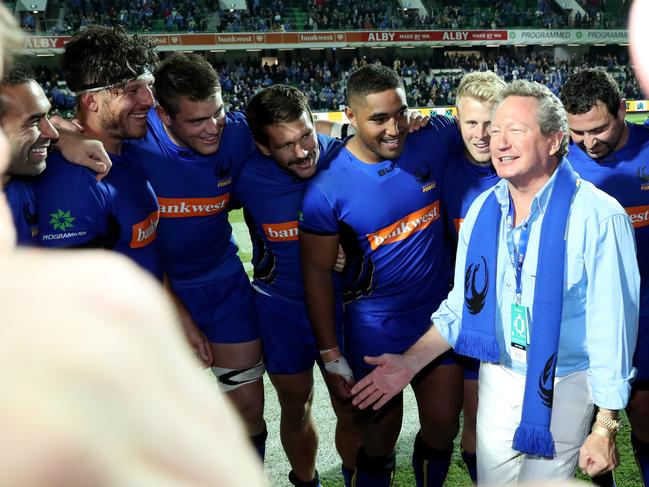 Philanthropist Andrew Forrest, founder of the World Series Rugby celebrates with Force players in 2018. Picture: AAP