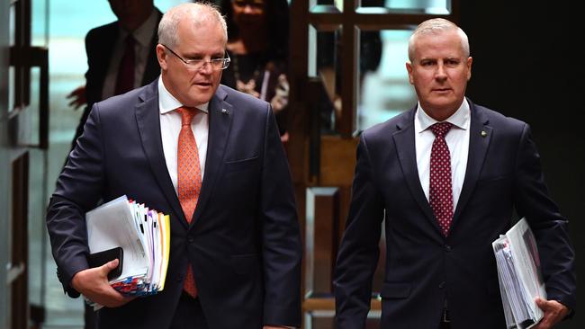 Prime Minister Scott Morrison and Deputy Prime Minister Michael McCormack arrive for Question Time in the House of Representatives at Parliament House in Canberra.