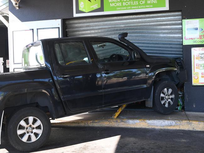 A Volkswagen Amarok was ram-raided into the Howard Springs Thirsty Camel on Monday morning, lodging itself on a bollard.  Picture Katrina Bridgeford.