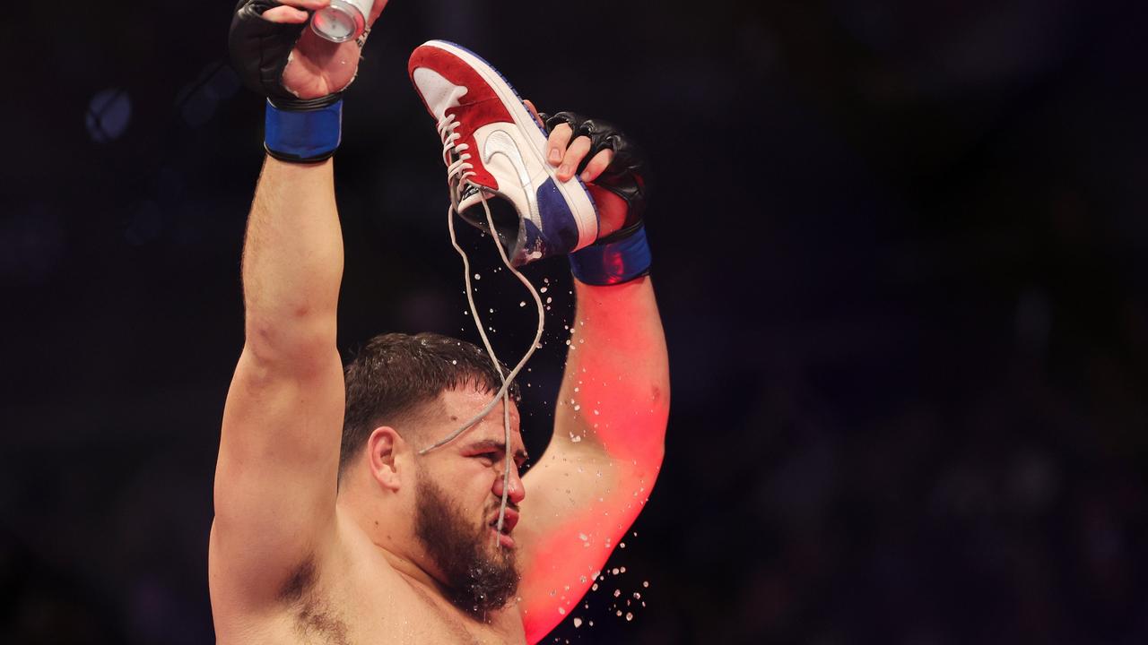 HOUSTON, TEXAS – FEBRUARY 12: Tai Tuivasa of Australia celebrates after winning his heavyweight fight against Derrick Lewis via a second-round knockout during UFC 271 at Toyota Center on February 12, 2022 in Houston, Texas. Carmen Mandato/Getty Images/AFP == FOR NEWSPAPERS, INTERNET, TELCOS &amp; TELEVISION USE ONLY ==