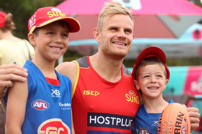 GOLD COAST, AUSTRALIA - JANUARY 23: Brandon Ellis poses with fans during a Gold Coast Suns AFL training session at Palm Beach Parklands on January 23, 2020 in Gold Coast, Australia. (Photo by Chris Hyde/Getty Images)