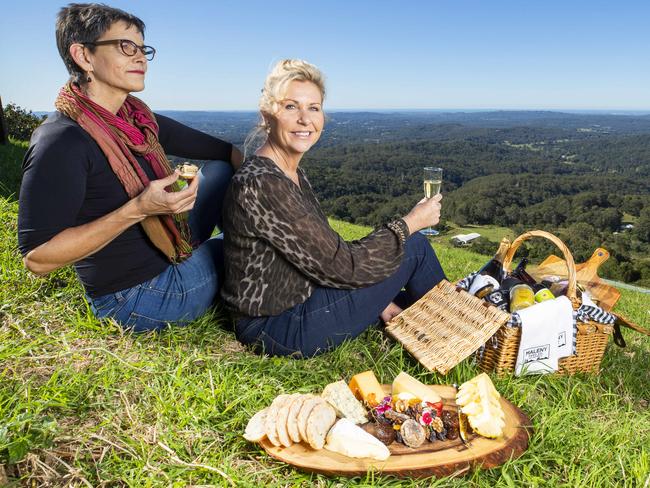 Jennifer Swaine and Karen Barnett enjoy the sights of Montville on the Sunshine Coast. That region enjoyed a tourism spending increase of more than 20 per cent. Picture Lachie Millard