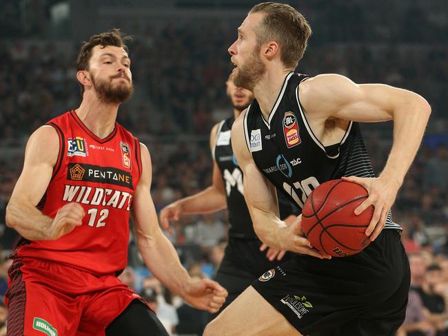 David Barlow (right) attempts to get aroud Angus Brandt. Picture: AAP