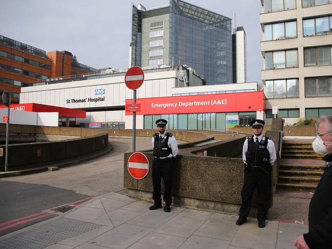 Police officers stand guard outside St Thomas' Hospital. Picture: AFP