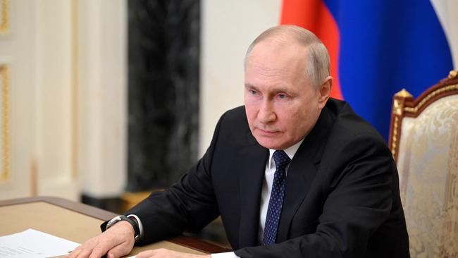 Russian President Vladimir Putin attends a meeting on Crimean Bridge attack via video link at the Kremlin in Moscow on July 17.