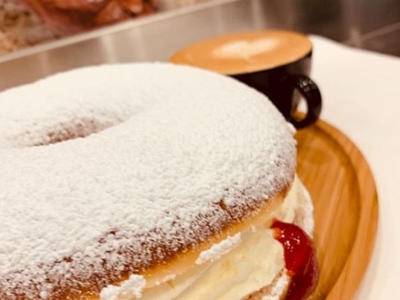 Lobethal Bakery’s big jam and cream donut - messy but worth it. Photo: Lobethal Bakery/Instagram