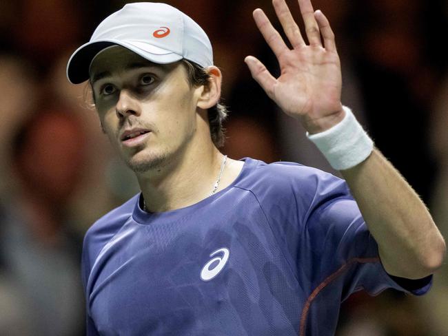 Australian Alex de Minaur waves after winning his men singles tennis match against Italy's Mattia Bellucci on the sixth day of the ATP Tour Rotterdam Open tennis tournament at the Ahoy venue in Rotterdam, on February 8, 2025. (Photo by Sander Koning / ANP / AFP) / Netherlands OUT