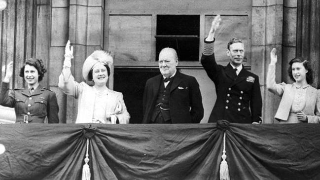 Britain's Prime Minister Winston Churchill, center, joins the royal family, from left, Princess Elizabeth, Queen Elizabeth, King George VI, and Princess Margaret, on the balcony of Buckingham Palace, London, England, on VE Day. Picture: AP.