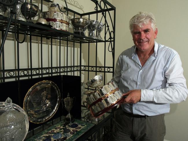 Former Australian Open CEO and doubles champion Paul McNamee with some of the trophies he won during his career. Picture: Stuart McEvoy