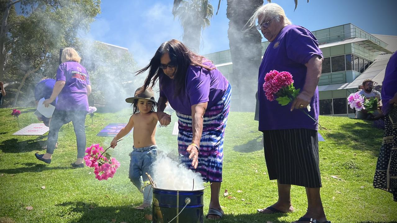 Attendees at the Day of Action against Family and Domestic Violence rally wore purple in support of victim survivors. Picture: Fia Walsh