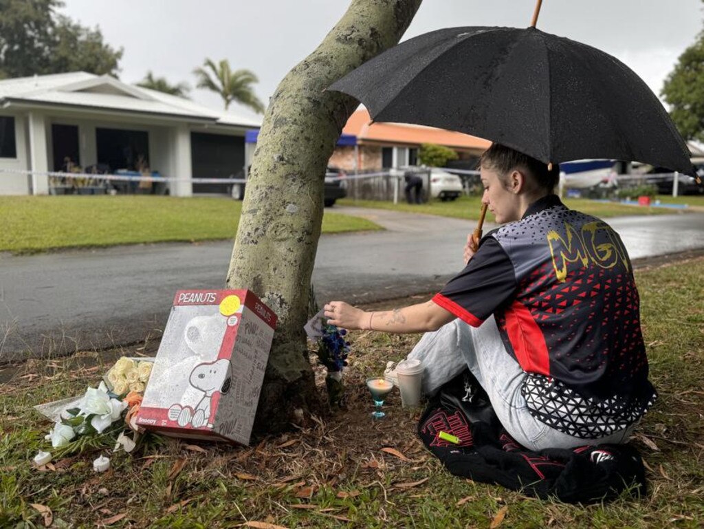 Tiffany Mulligan brought brilliant blue orchids and lit a gin-themed candle, the liquor of her best friend’s drink of choice. Picture: Heidi Petith