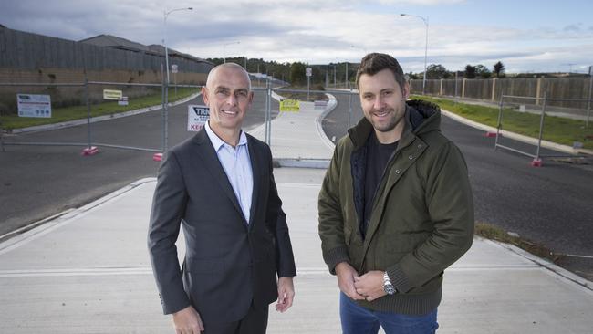 Camden state Liberal MP Chris Patterson and Spring Farm resident Ben Von Wartburg after the government announced $30 million to plan the Spring Farm parkway last year. Picture: Melvyn Knipe