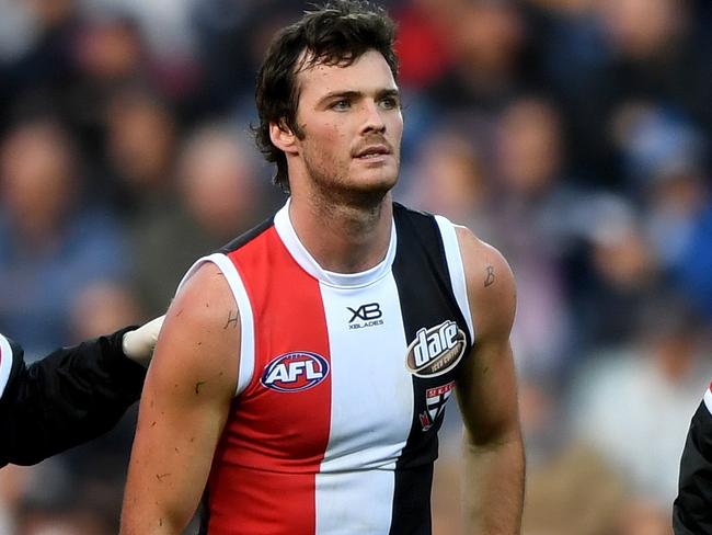 Dylan Roberton of the Saints is taken off the ground after fainting during the Round 4 AFL match between the Geelong Cats and the St Kilda Saints at GMBHA Stadium in Geelong, Sunday, April 15, 2018. (AAP Image/Joe Castro) NO ARCHIVING, EDITORIAL USE ONLY