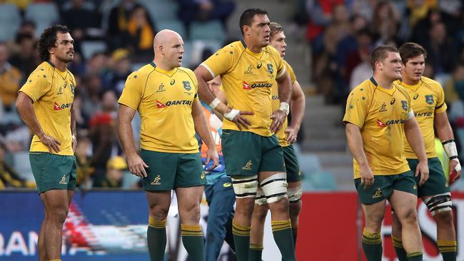 The Wallabies look dejected after a Scotland try.